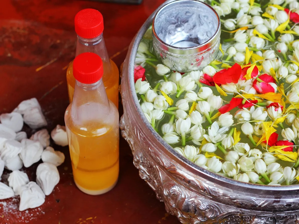 Scented water used for bathing Buddha images during Thai New Year festival